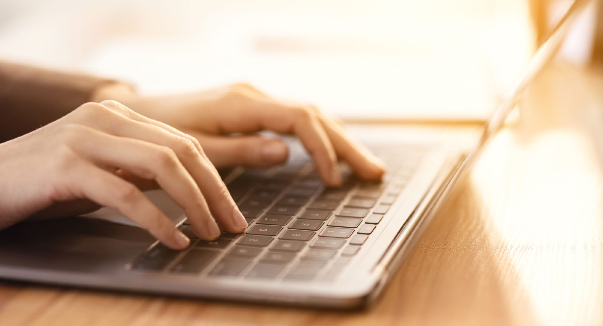 laptop_hands_1200x650