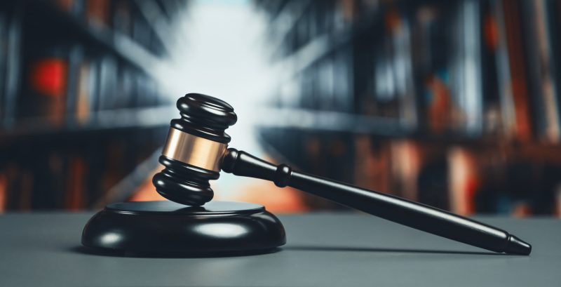 Focus wooden gavel hammer on blur background. equility